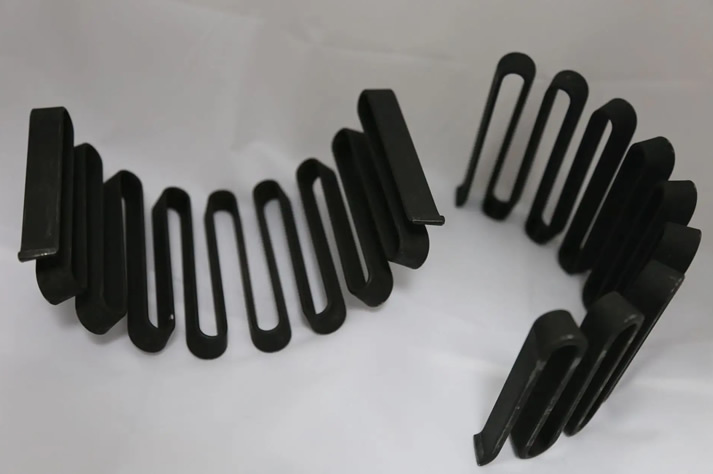 The serpentine spring is made of elastic material